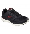 Deportivo de color negro con la suela en blanco