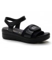 Sandalia en piel negra y velcro en empeine