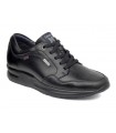 Deportivo de piel negra con cordones