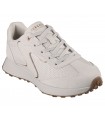 Deportivo Skechers en blanco roto para mujer.