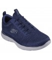 Deportivo Skechers en azul marino con suela gris.