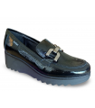 Mocasines de cuña con estribo en color negro.
