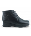 Botines negros con cordones elásticos. Piel natural.